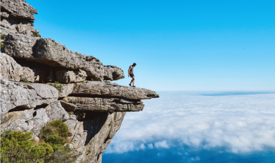 Man standing in the mountain